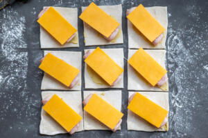 Cheese on top of ham.