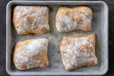 Baked Sourdough Ciabatta on a baking sheet.