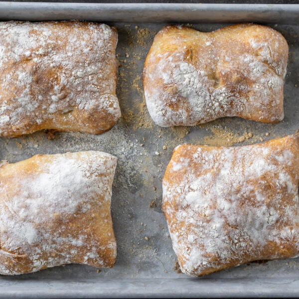Baked Sourdough Ciabatta on a baking sheet.