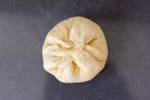 Dough pulled together with a filling.