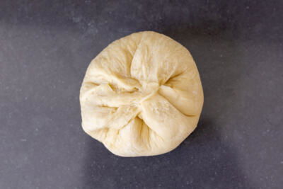 Dough pulled together with a filling.