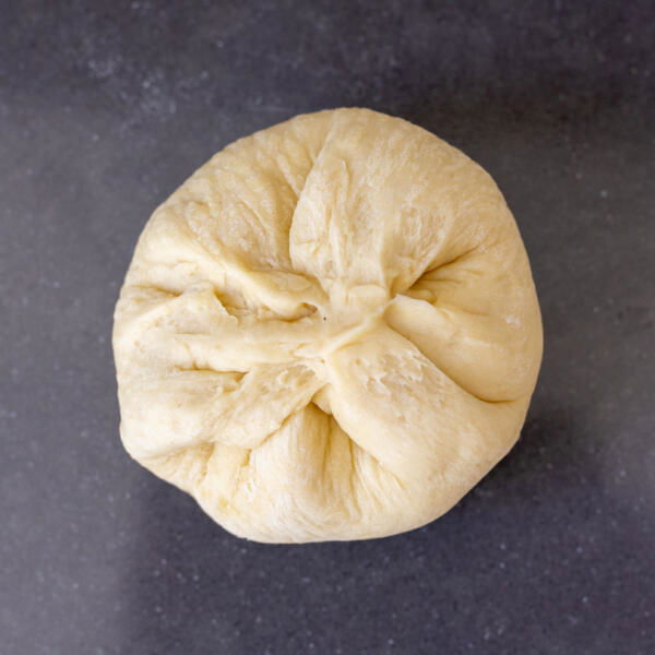 Dough pulled together with a filling.