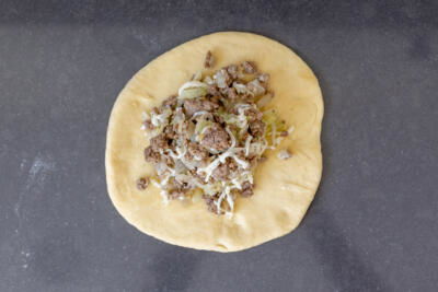 Dough with meat filling.