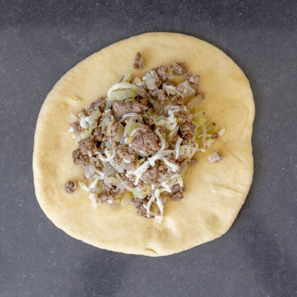 Dough with meat filling.