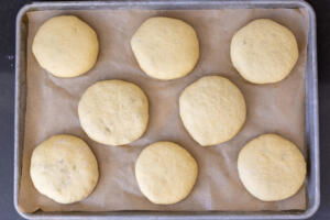 Bierocks before baking on a baking sheet.