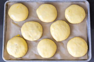 Bierocks before baking on a baking sheet.