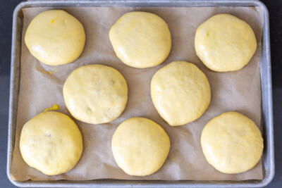 Bierocks before baking on a baking sheet.