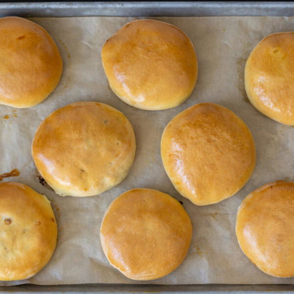 Baked Bierocks on a baking sheet.