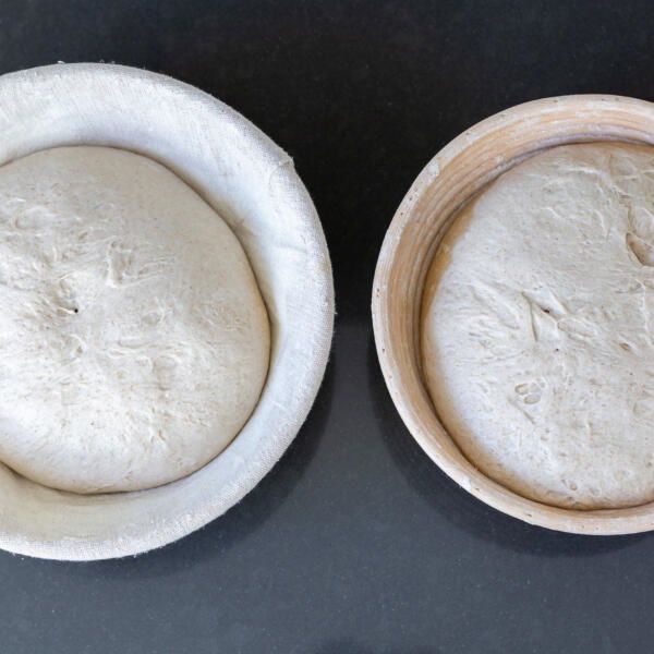 High Hydration Sourdough Bread in a bread basket.