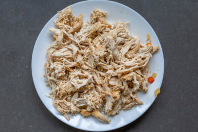 Shredded chicken on a plate.
