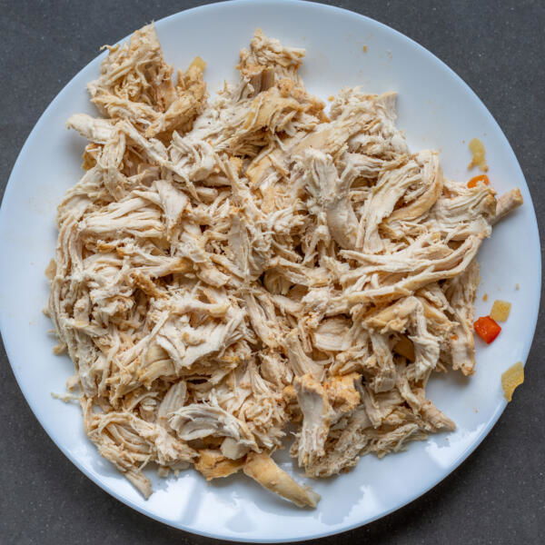 Shredded chicken on a plate.