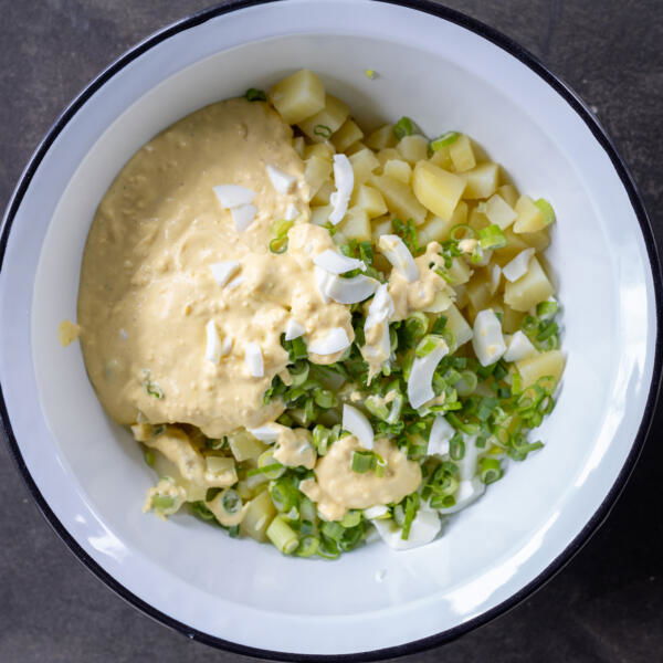 All the salad ingredients in a bowl.