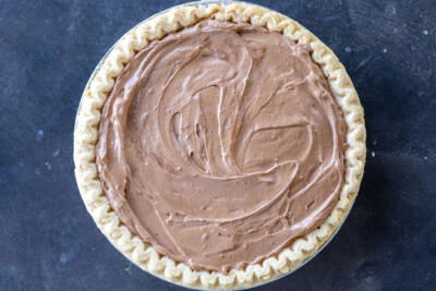 Baked pie crust with french silk pie filling.