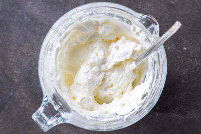 Heavy whipping cream in a dish.