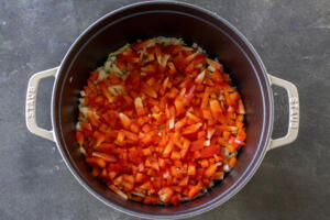 Veggies in a pan cooking.
