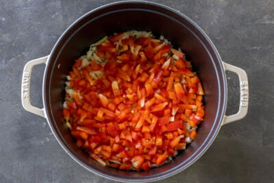 Veggies in a pan cooking.