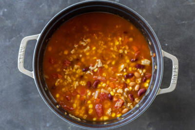 Turkey chili simmering in a pot.