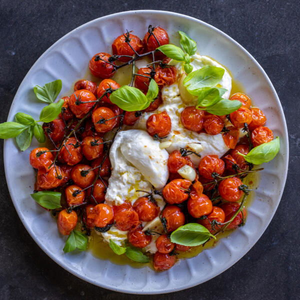 Plated Braised Tomatoes with Burrata.