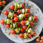 Plated Caprese Salad Skewers.