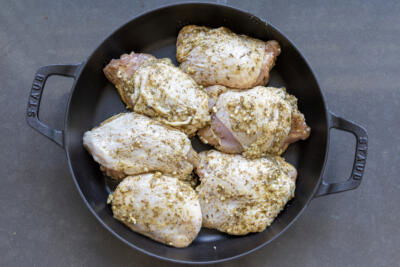 Baking pan with cooked Greek Lemon Chicken.