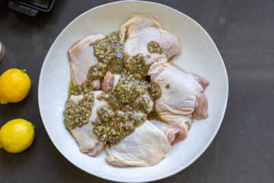 Chicken with seasoning added.