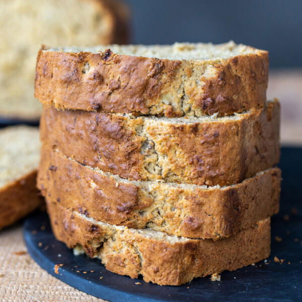 Sliced up banana bread on a tray.