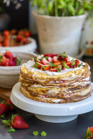 Cake stand with Strawberry Crepe Cake.