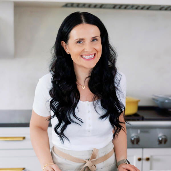 Natalya smiling in the kitchen