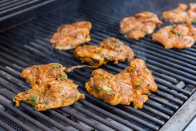 Cilantro Lime Chicken cooking on a grill.