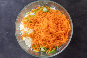 All the veggies sliced up in a bowl.