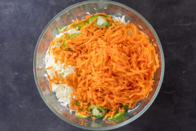 All the veggies sliced up in a bowl.