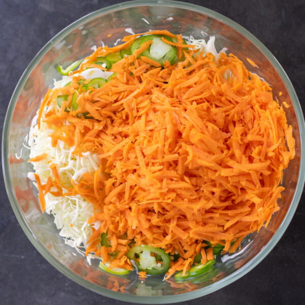 All the veggies sliced up in a bowl.
