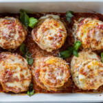 Baked Eggplant Parmesan in a pan.