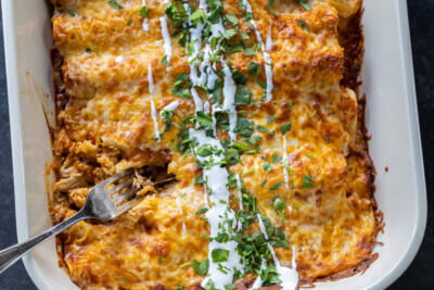 Baked Chicken Enchiladas in a baking dish.