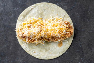 Tortilla with chicken and cheese.