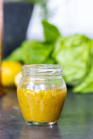 Honey Dijon Dressing in a little jar.