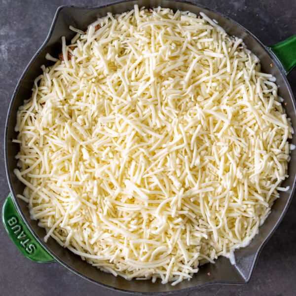 Cheese in a skillet.