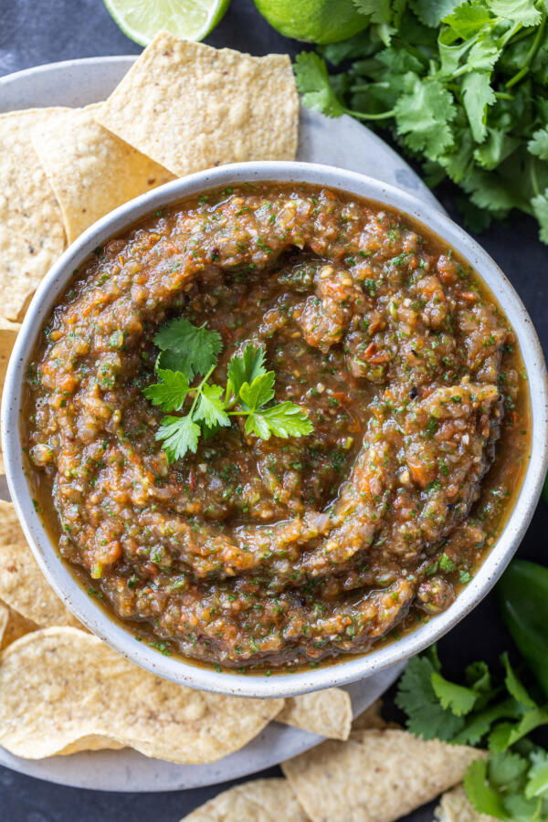 A bowl with Roasted Tomato Salsa.