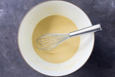 Crepe batter in a bowl.