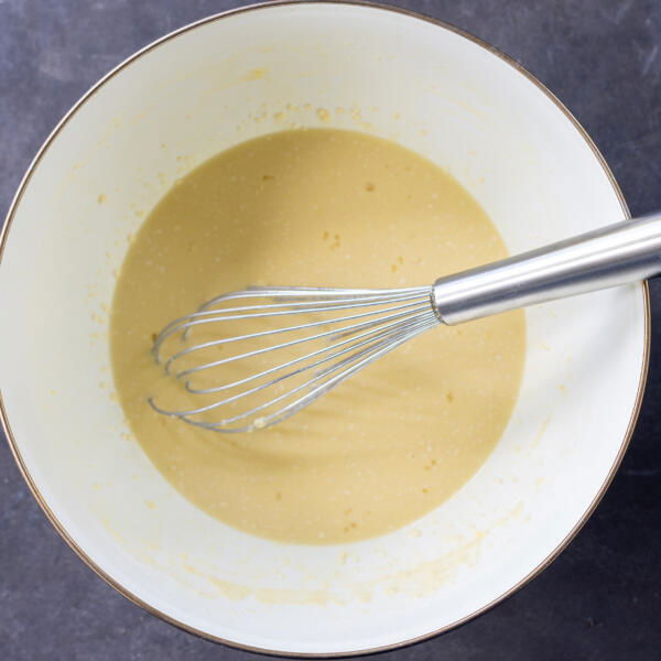 Crepe batter in a bowl.