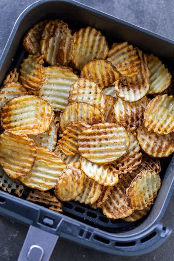 Air Fryer basket with Air Fryer Waffle Fries .