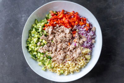 Creamy Tuna Pasta Salad ingredients in a bowl.