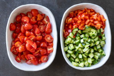 Diced up tomato, bell pepper and cucumber.