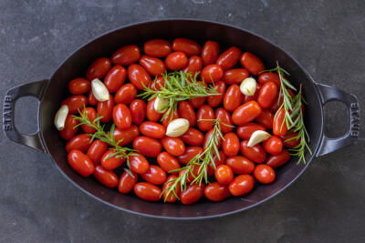 Tomatoes with herbs and garlic.