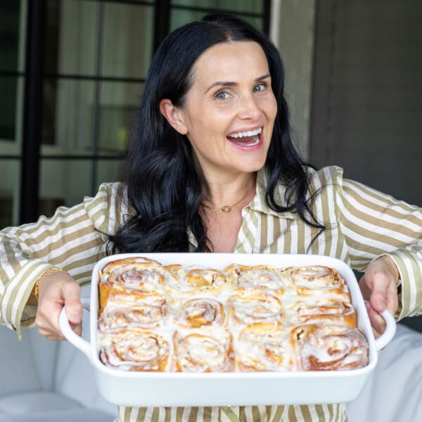 Natalya with a pan of Apple Cinnamon Rolls.