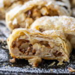 Apple Strudel sliced up on a tray.