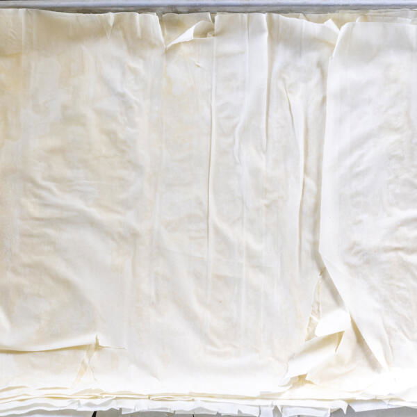 Phyllo dough on a baking sheet.