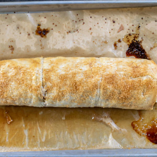 Apple Strudel on a baking sheet.