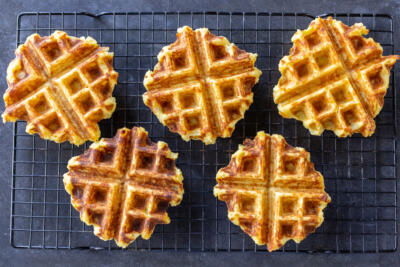 Crispy Mashed Potato Waffles on a cooling rack.