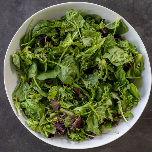 Green leaves in a bowl.